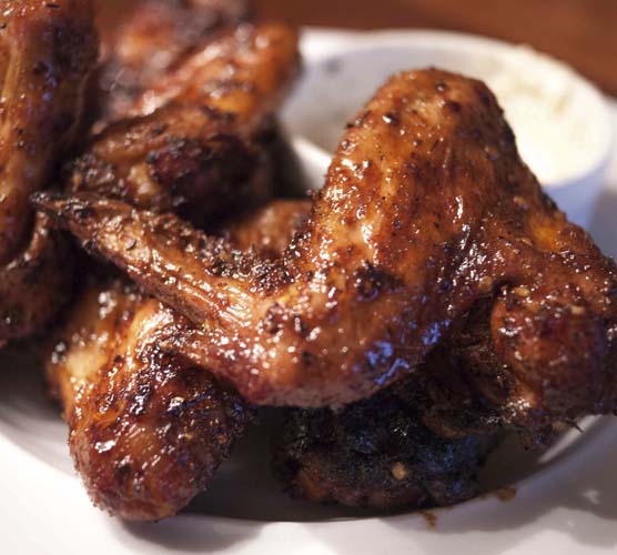 Cooked chicken wings on a plate